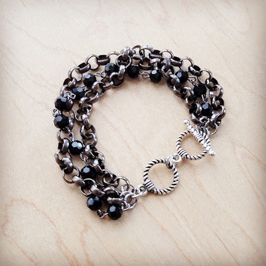 **Black Faceted Triple Strand Beaded Bracelet