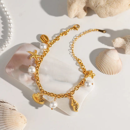 Ocean Theme Stainless Steel Chain Bracelet with Seashell and Starfish Pendants