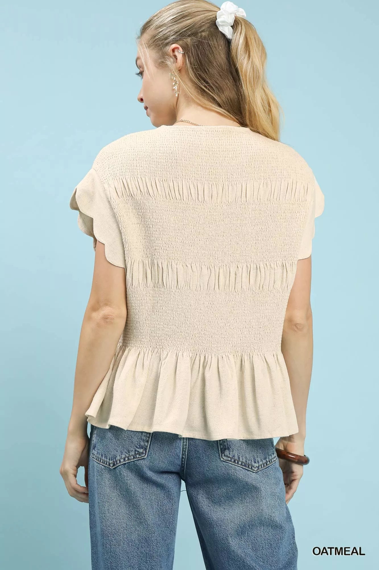 Umgee Linen Blend Smocked Peplum Blouse