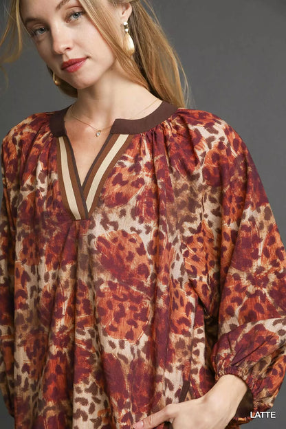 Umgee Animal Print Boho Tunic Dress with Contrast Trim Detail
