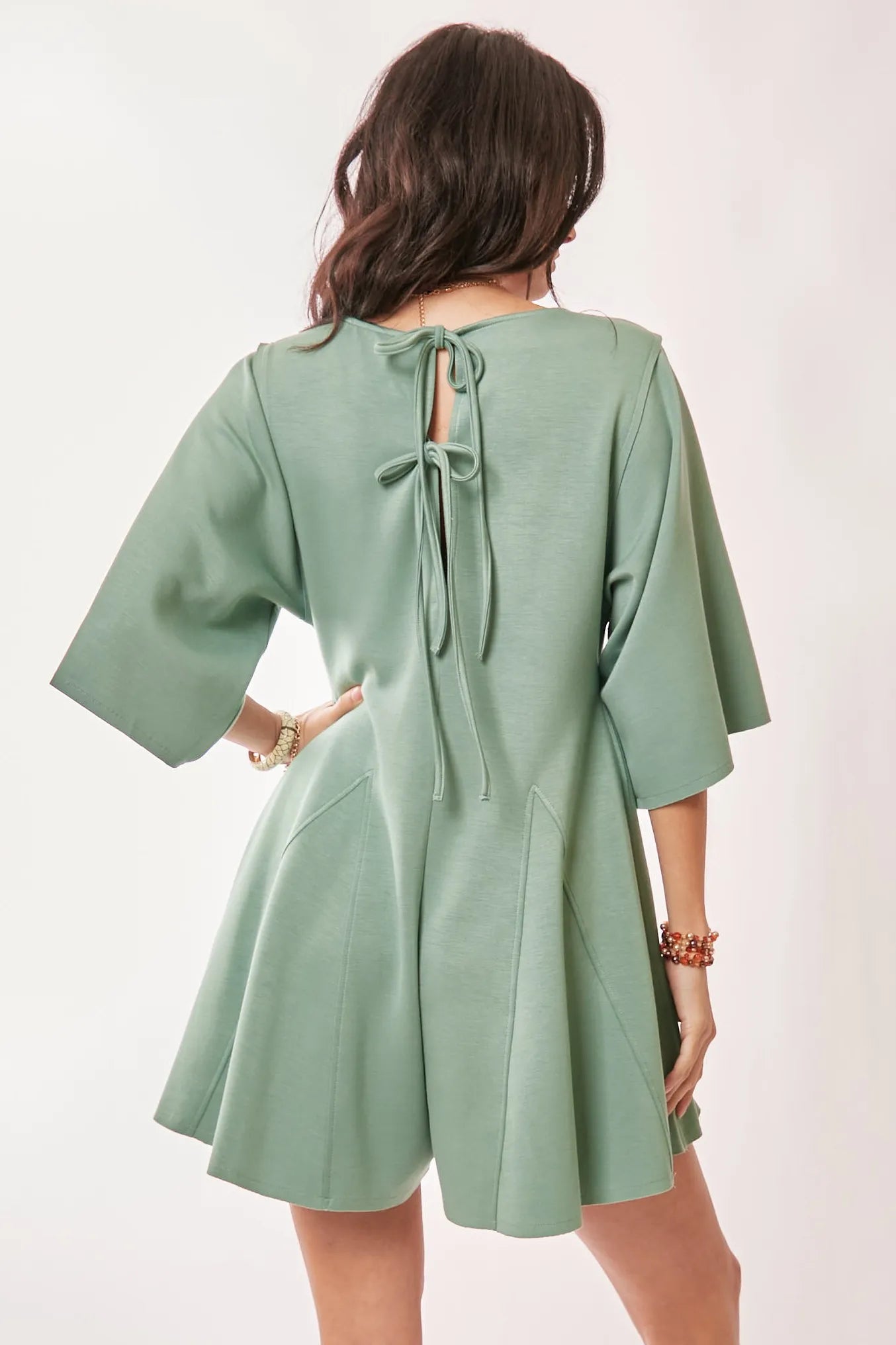 Davi & Dani Solid Draped Sleeve Ties Back Skort Romper