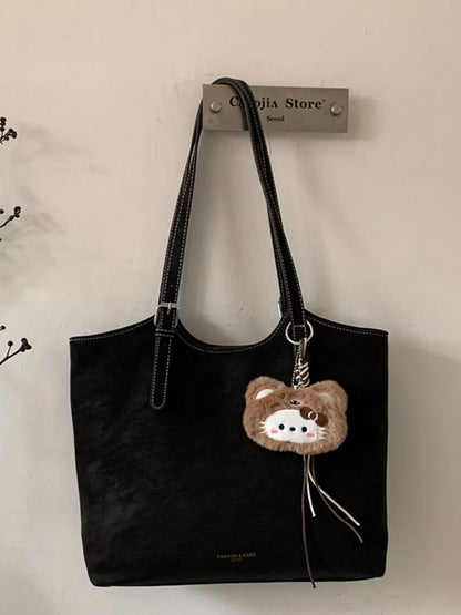 Solid Color Handbag with Plush Charm