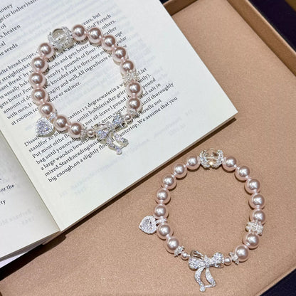 Pearl Bracelet with Bow Charm