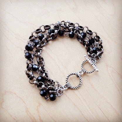 **Black Faceted Triple Strand Beaded Bracelet