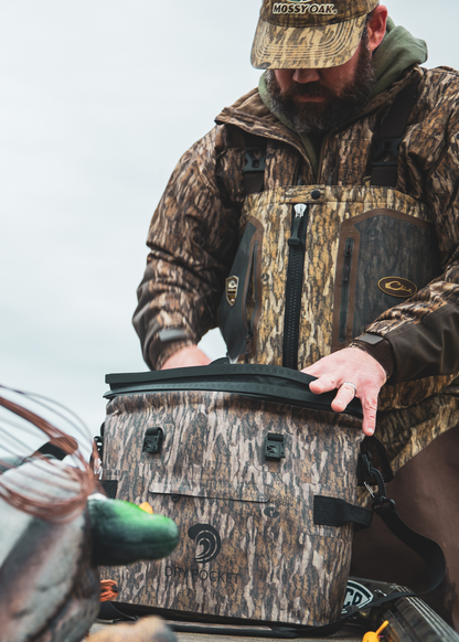 PRE-ORDER - Mossy Oak - Auto-Sealing, Waterproof, Floating, Scent Proof Day-Pack Cooler