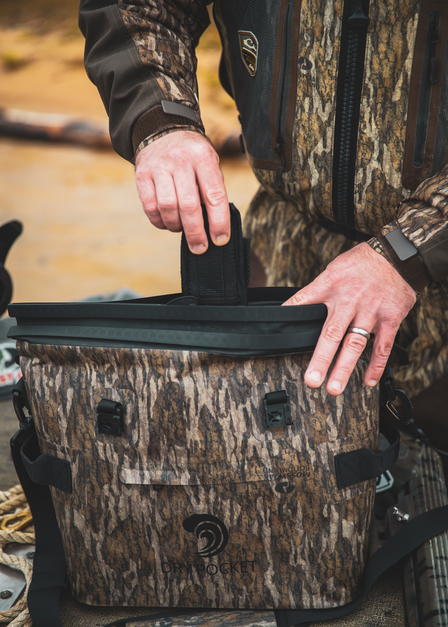 PRE-ORDER - Mossy Oak - Auto-Sealing, Waterproof, Floating, Scent Proof Day-Pack Cooler