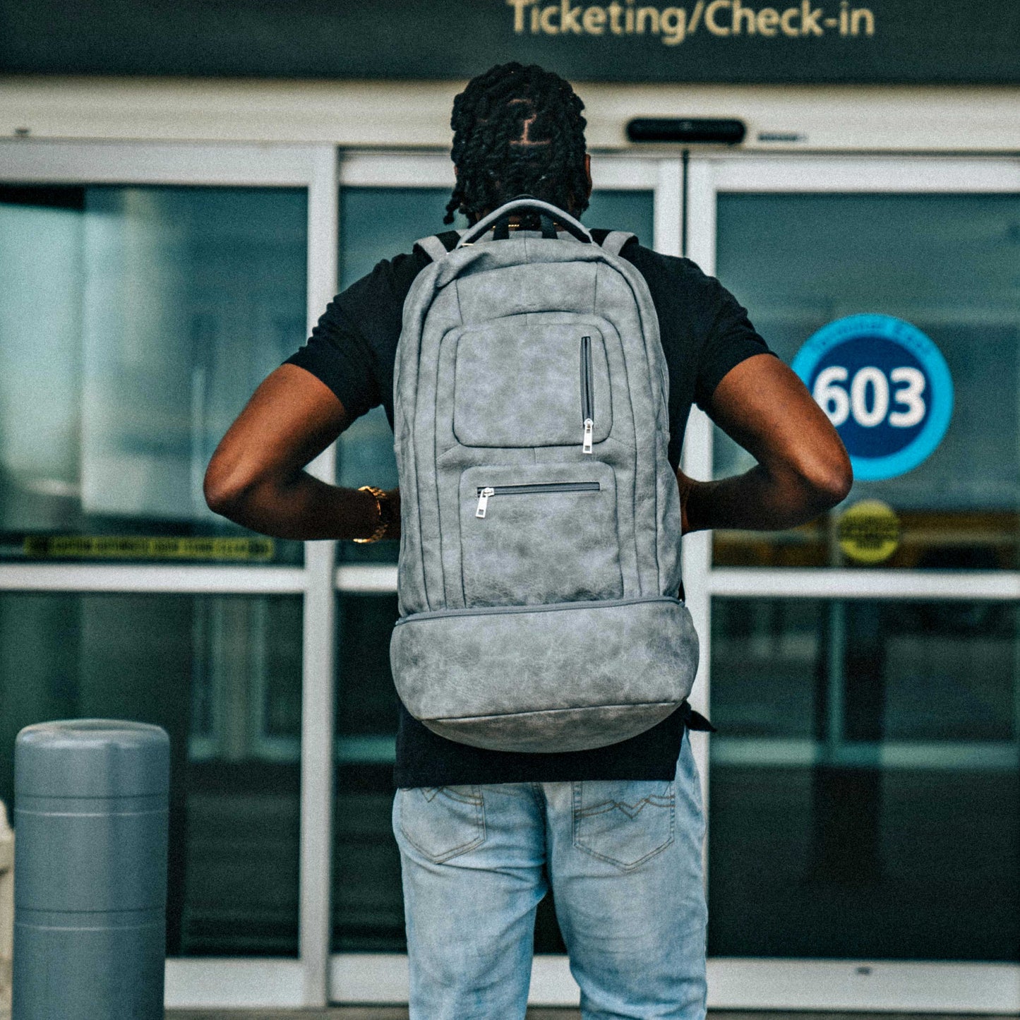 Grey Leather Carry-On Patented Backpack