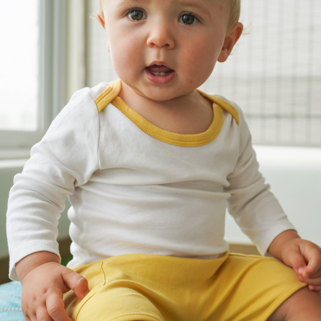 Long Sleeve Bodysuit in White with Misted Yellow