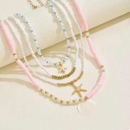 4 Piece Beaded Starfish Charm Necklace